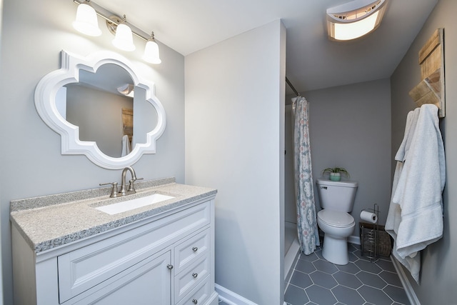 1817 2nd Pl, Saint Charles, IL 60174 - full bathroom with vanity, toilet, baseboards, and tile patterned flooring
