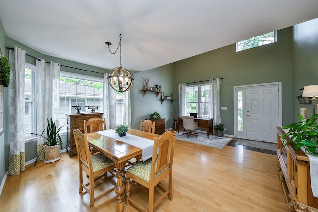 1817 2nd Pl, Saint Charles, IL 60174 - dining room with a chandelier, light wood-type flooring, and baseboards