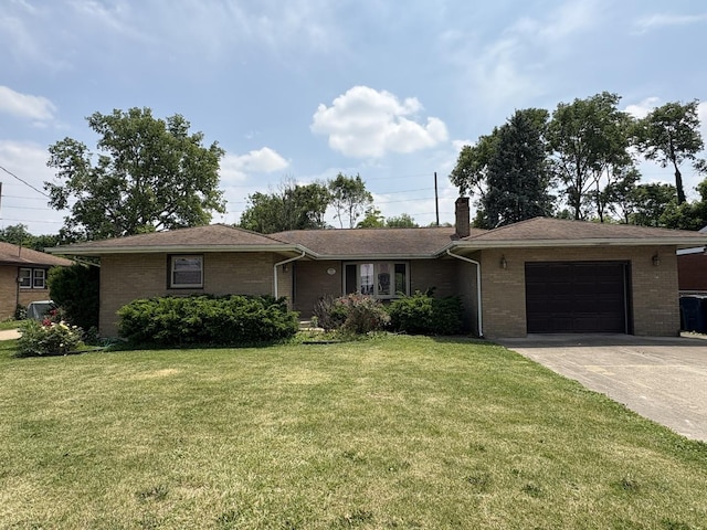 1515 Johnson St, Ottawa, IL 61350 - ranch-style house with an attached garage, brick siding, a front yard, and concrete driveway