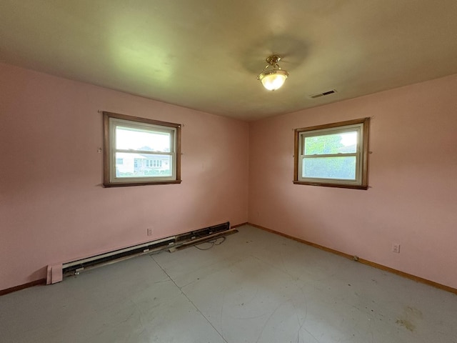 1515 Johnson St, Ottawa, IL 61350 - spare room with baseboards and baseboard heating