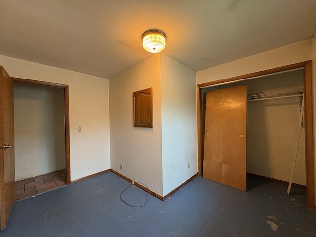 1515 Johnson St, Ottawa, IL 61350 - unfurnished bedroom featuring baseboards and a closet
