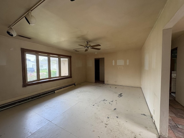 1515 Johnson St, Ottawa, IL 61350 - unfurnished room with a baseboard radiator and a ceiling fan