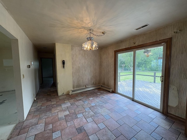 1515 Johnson St, Ottawa, IL 61350 - unfurnished dining area with baseboard heating, a chandelier, and stone finish flooring