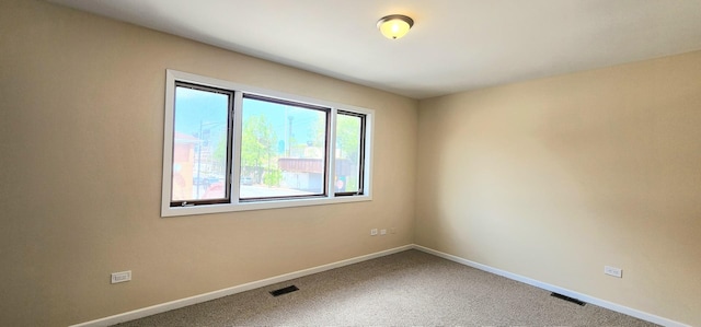 2338 S Canal St Unit H, Chicago, IL 60616 - spare room featuring baseboards and carpet flooring
