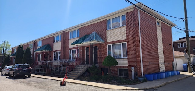 2338 S Canal St Unit H, Chicago, IL 60616 - view of front facade featuring brick siding