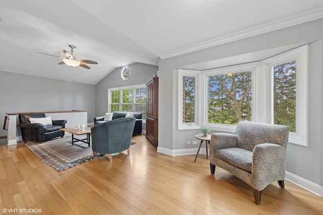 427 Dorset Pl, Glen Ellyn, IL 60137 - living area featuring a ceiling fan, light wood finished floors, baseboards, lofted ceiling, and crown molding
