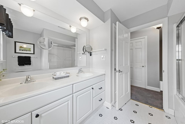 427 Dorset Pl, Glen Ellyn, IL 60137 - full bathroom with a shower with door, double vanity, baseboards, and tile patterned floors