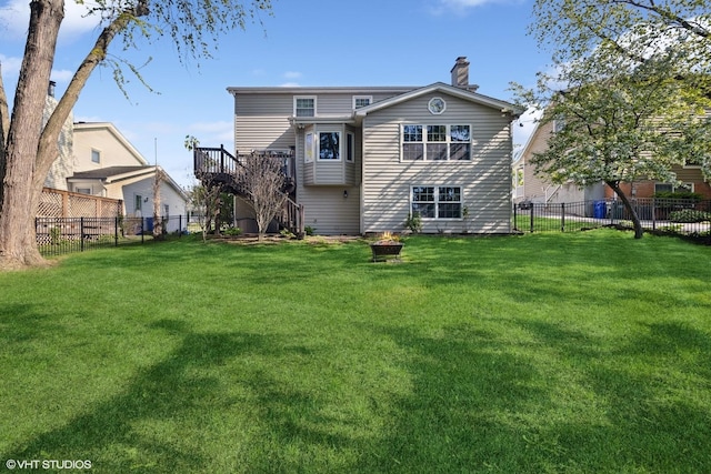 427 Dorset Pl, Glen Ellyn, IL 60137 - back of property with a chimney, a fire pit, stairway, and a deck