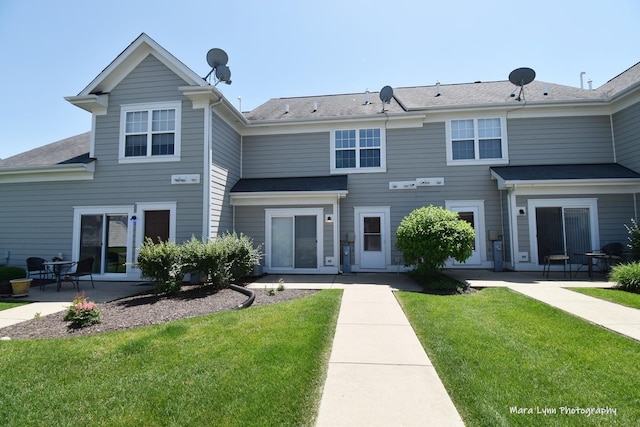 1218 Mariemont Rd Unit C, Sugar Grove, IL 60554 - rear view of property with a patio and a yard