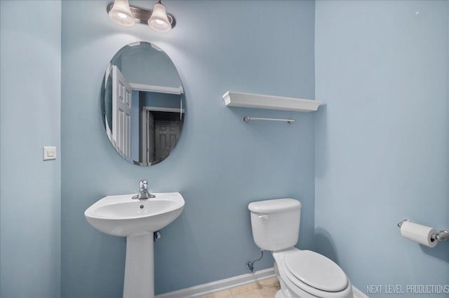1218 Mariemont Rd Unit C, Sugar Grove, IL 60554 - half bathroom featuring toilet, baseboards, a sink, and tile patterned flooring