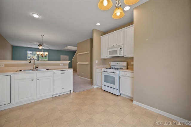 1218 Mariemont Rd Unit C, Sugar Grove, IL 60554 - kitchen with white appliances, a sink, a chandelier, and light countertops