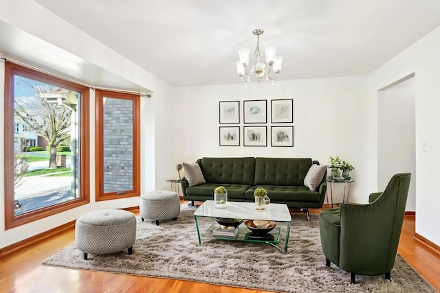 1337 E Thacker St, Schaumburg, IL 60173 - living room featuring a chandelier and wood finished floors