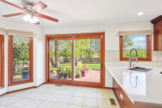1337 E Thacker St, Schaumburg, IL 60173 - doorway featuring a sink, healthy amount of natural light, a ceiling fan, recessed lighting, and baseboards