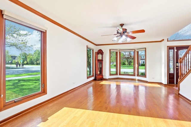 1337 E Thacker St, Schaumburg, IL 60173 - foyer entrance featuring wood finished floors, baseboards, ceiling fan, crown molding, and stairs