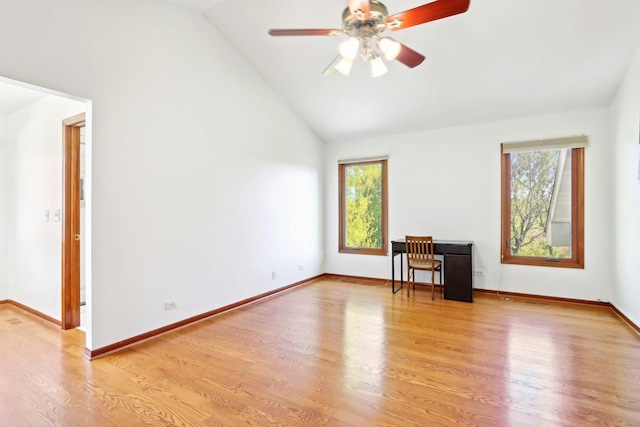 1337 E Thacker St, Schaumburg, IL 60173 - empty room with healthy amount of natural light, light wood finished floors, ceiling fan, baseboards, and high vaulted ceiling