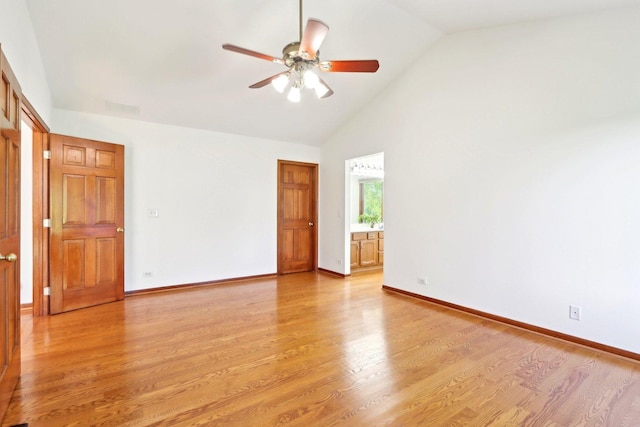 1337 E Thacker St, Schaumburg, IL 60173 - empty room with ceiling fan, light wood-style floors, baseboards, and high vaulted ceiling