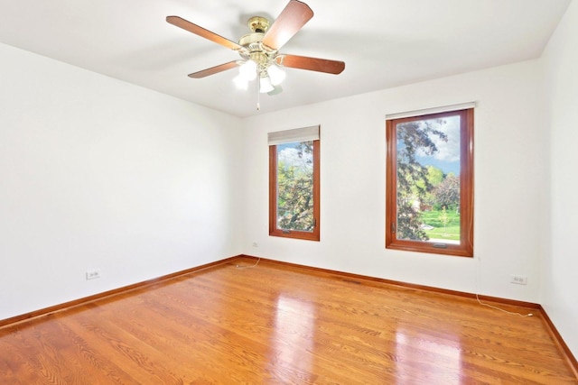 1337 E Thacker St, Schaumburg, IL 60173 - unfurnished room featuring baseboards, wood finished floors, and ceiling fan