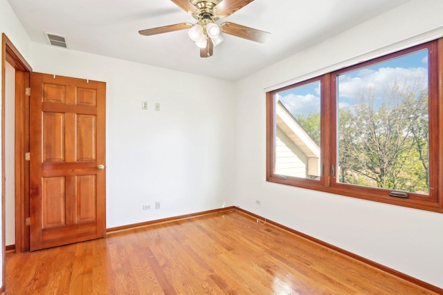 1337 E Thacker St, Schaumburg, IL 60173 - unfurnished room with baseboards, light wood-type flooring, and a ceiling fan