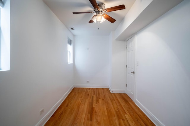 2512 N Marshfield Ave, Chicago, IL 60614 - unfurnished room with light wood finished floors, ceiling fan, and baseboards