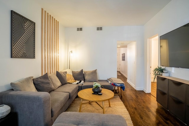 2512 N Marshfield Ave, Chicago, IL 60614 - living room featuring dark wood-type flooring and baseboards