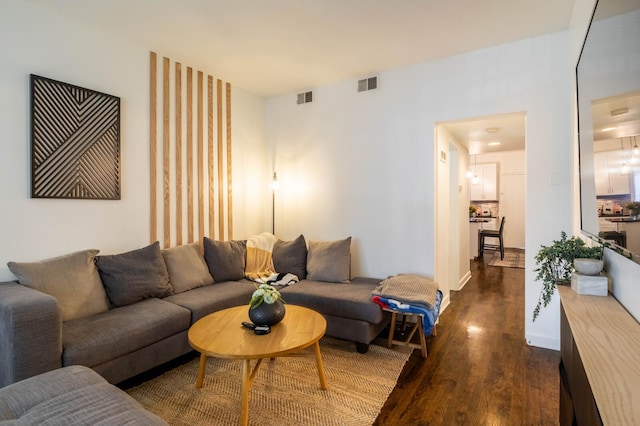 2512 N Marshfield Ave, Chicago, IL 60614 - living room featuring dark wood finished floors and baseboards