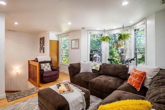 2512 N Marshfield Ave, Chicago, IL 60614 - living room featuring wood finished floors, baseboards, and recessed lighting