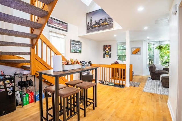 2512 N Marshfield Ave, Chicago, IL 60614 - dining area featuring recessed lighting, light wood-type flooring, stairway, and baseboards