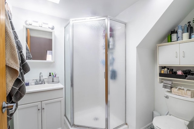 2512 N Marshfield Ave, Chicago, IL 60614 - full bathroom featuring vanity, a stall shower, and toilet