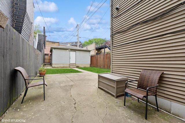 2512 N Marshfield Ave, Chicago, IL 60614 - fenced backyard with a patio area and an outdoor structure