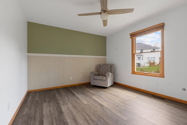 3739 Applewood Ln, Rockford, IL 61114 - unfurnished room with wood finished floors, ceiling fan, and baseboards