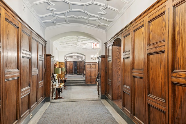 5000 S E End Ave Unit 13A, Chicago, IL 60615 - hallway with arched walkways, ornamental molding, wainscoting, coffered ceiling, and carpet