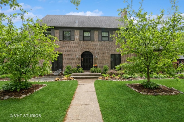 723 Gardner Rd, Flossmoor, IL 60422 - view of front of home with a front lawn, brick siding, and a shingled roof