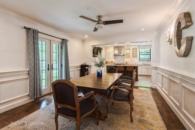 723 Gardner Rd, Flossmoor, IL 60422 - dining area with a decorative wall, crown molding, dark wood-style floors, french doors, and a wainscoted wall