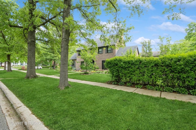 723 Gardner Rd, Flossmoor, IL 60422 - view of front of house featuring a front yard and brick siding