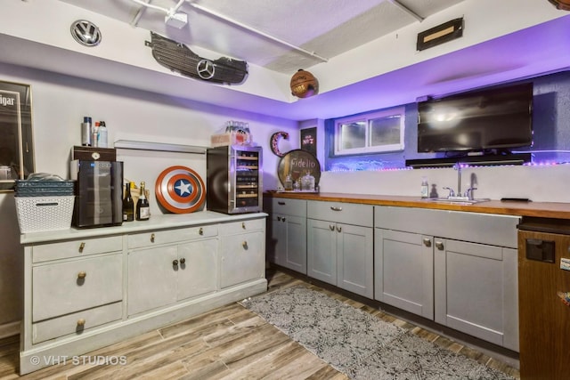 723 Gardner Rd, Flossmoor, IL 60422 - bar featuring light wood-style flooring and beverage cooler