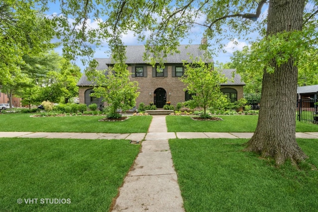 723 Gardner Rd, Flossmoor, IL 60422 - tudor house featuring brick siding and roof with shingles
