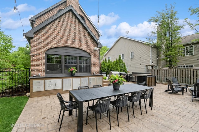 723 Gardner Rd, Flossmoor, IL 60422 - fenced backyard featuring a patio area, outdoor dining area, and a covered hot tub