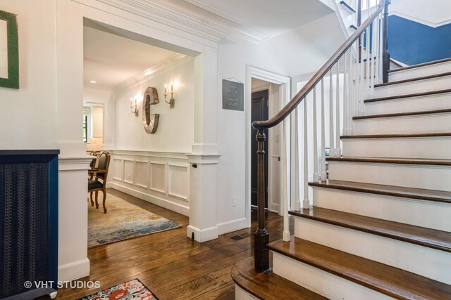 723 Gardner Rd, Flossmoor, IL 60422 - stairway with wood finished floors, ornamental molding, wainscoting, and a decorative wall