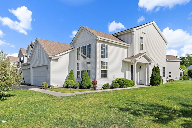 315 Maryland Ln, Pingree Grove, IL 60140 - traditional-style house featuring a front yard, roof with shingles, and an attached garage