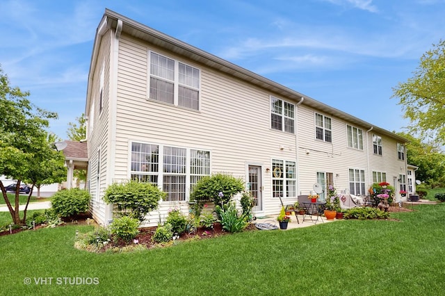 105 Grandview Ct, Volo, IL 60020 - rear view of house featuring a lawn and a patio