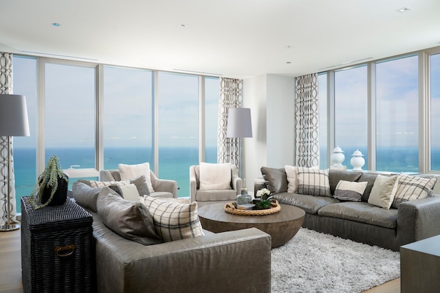 363 E Wacker Dr Unit 6106, Chicago, IL 60601 - living area featuring floor to ceiling windows, wood finished floors, and a water view