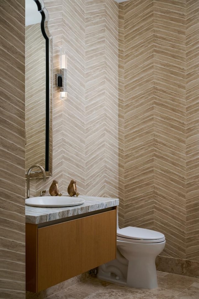 363 E Wacker Dr Unit 6106, Chicago, IL 60601 - bathroom featuring vanity, toilet, and tile walls