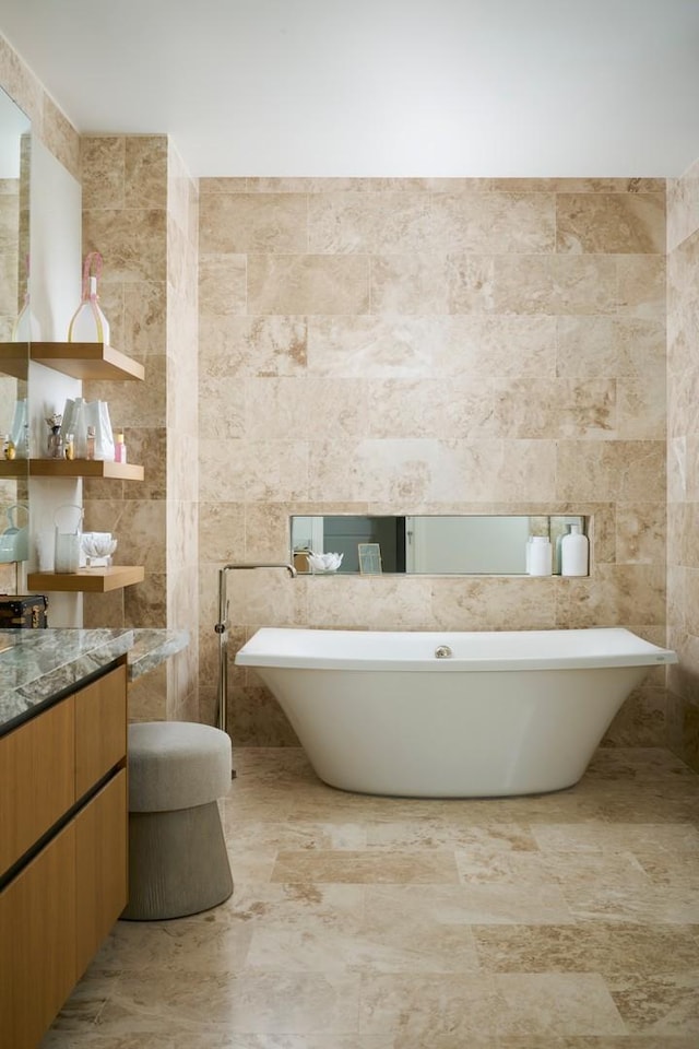 363 E Wacker Dr Unit 6106, Chicago, IL 60601 - bathroom with tile walls, vanity, and a soaking tub
