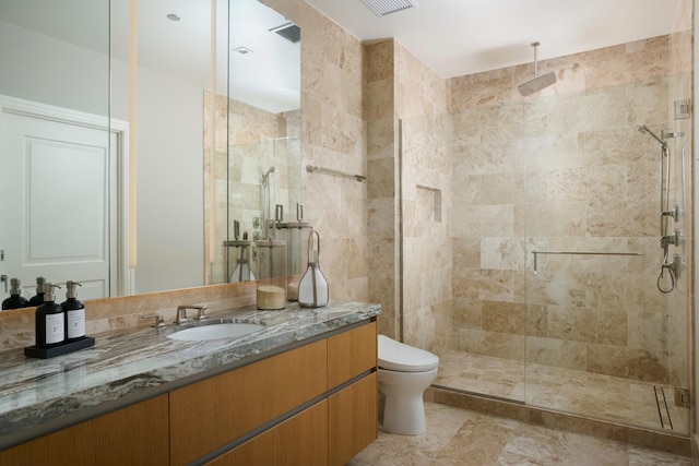 363 E Wacker Dr Unit 6106, Chicago, IL 60601 - bathroom with a shower stall, vanity, and toilet