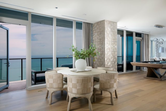 363 E Wacker Dr Unit 6106, Chicago, IL 60601 - dining area with floor to ceiling windows and wood finished floors