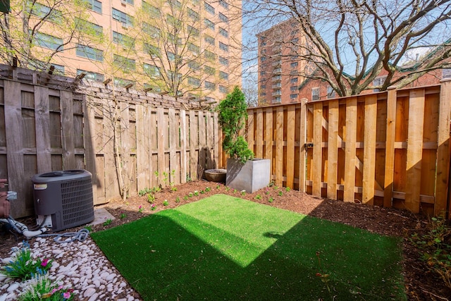 fenced backyard with central AC