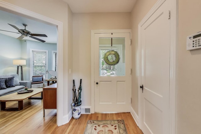 5484 S Hyde Park Blvd, Chicago, IL 60615 - foyer featuring light wood-type flooring, baseboards, and a ceiling fan