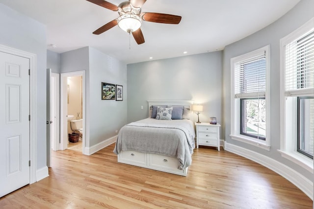 5484 S Hyde Park Blvd, Chicago, IL 60615 - bedroom featuring multiple windows, light wood-type flooring, baseboards, and a ceiling fan
