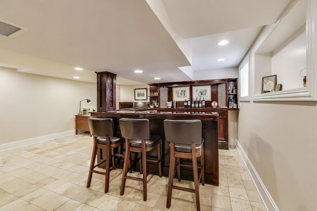 5484 S Hyde Park Blvd, Chicago, IL 60615 - indoor bar featuring recessed lighting and baseboards