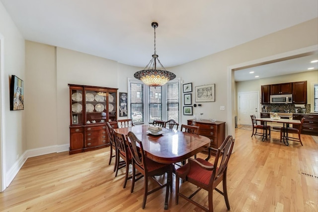 5484 S Hyde Park Blvd, Chicago, IL 60615 - dining area featuring light wood-style flooring, recessed lighting, and baseboards
